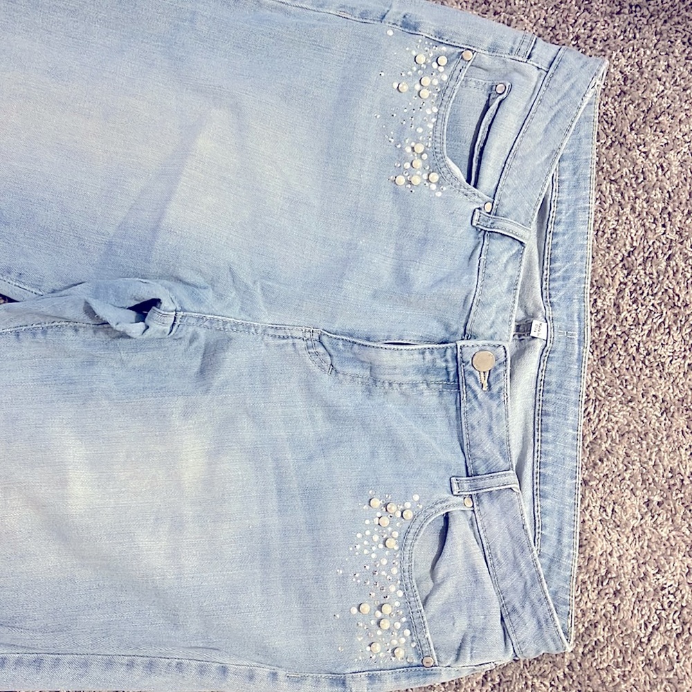 Jennifer Lopez ankle jeans with rhinestone around pockets